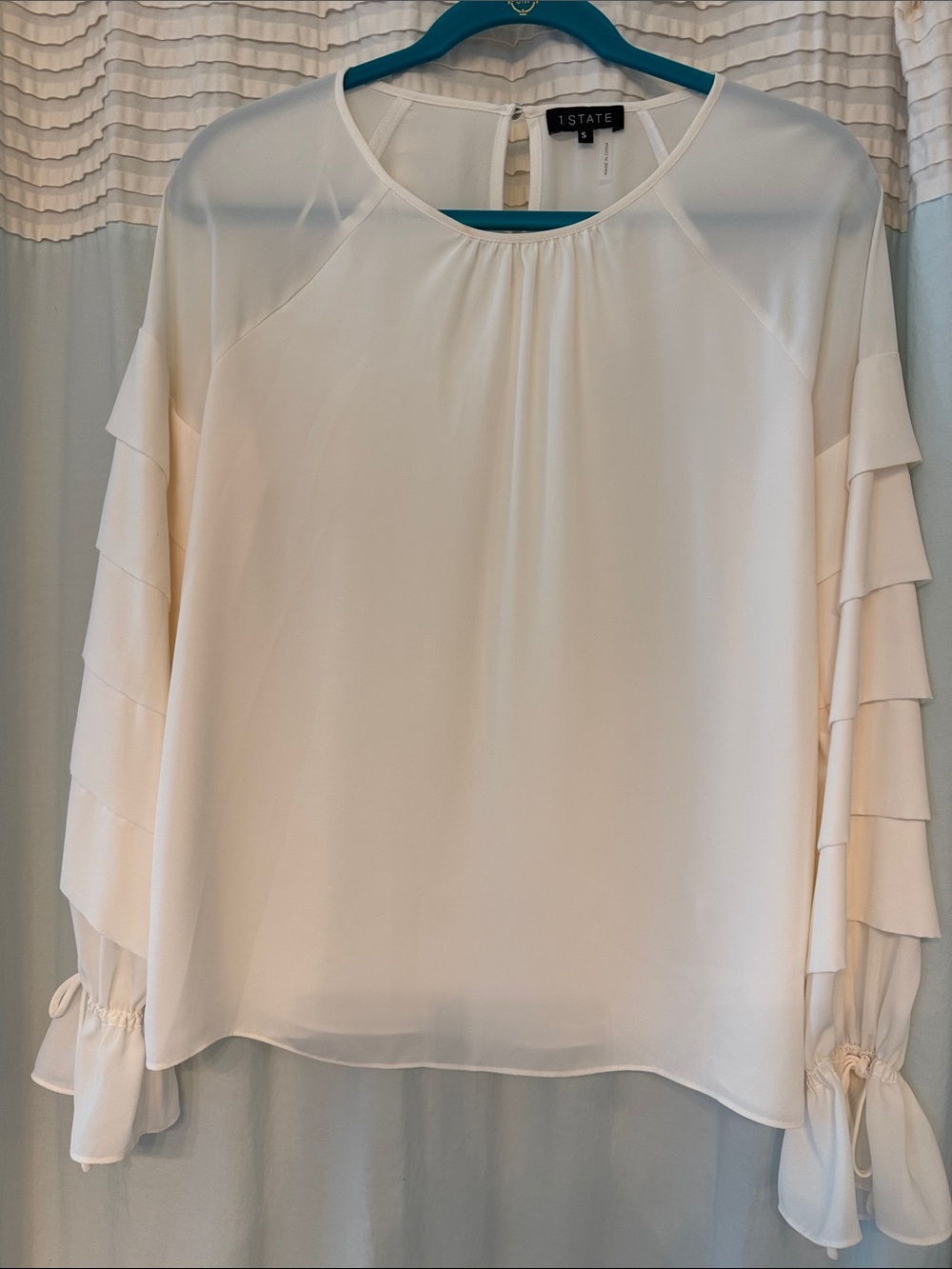 1. State Cream Ruffle Sleeve Blouse